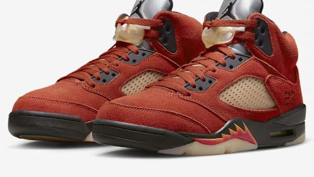 View of red and black Air Jordan shoes.